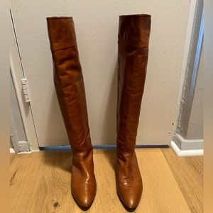 Tall brown leather boots